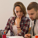 Illustration for article titled Couple Stressing About Wedding Plans As If It Won’t Just Take A String Of Edison Bulbs To Knock Guests’ Fucking Socks Off